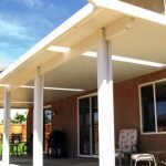 White Aluminum Insulated patio cover with skylights