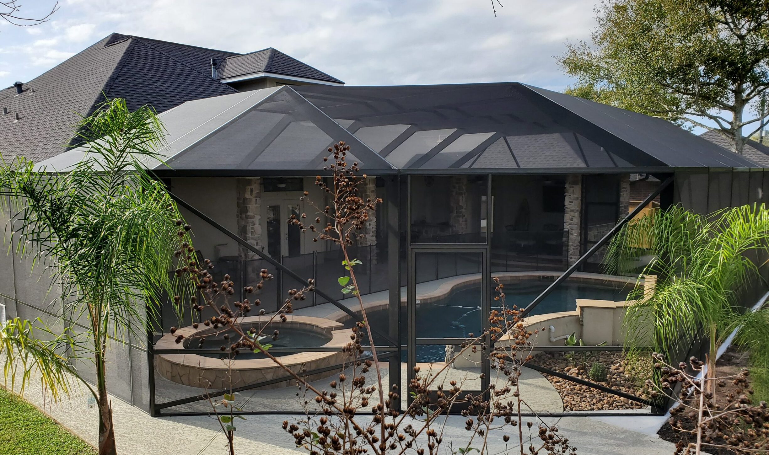 Side view of a custom aluminum pool enclosure