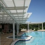 Lattice by the poolside attached in white Houston