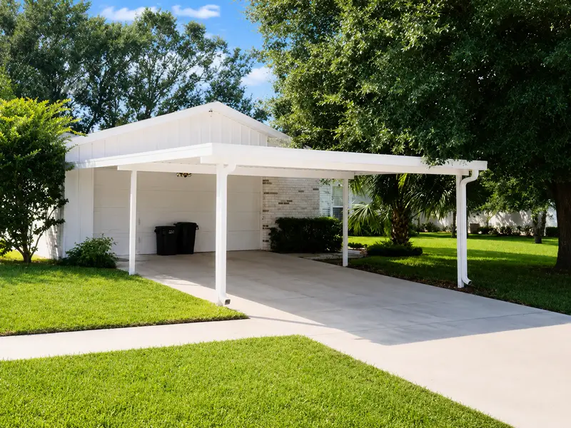 Custom insulated aluminum carport cover installed in Brazoria County by Simmons Home Design
