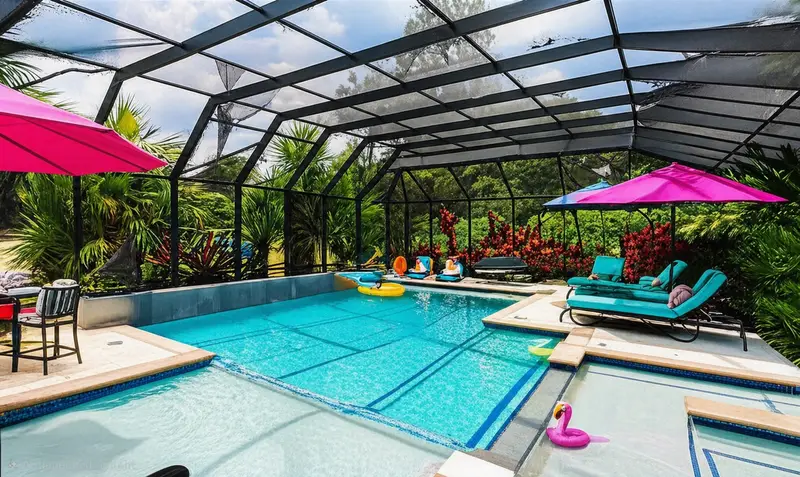 Pool enclosure after new screen panels were installed