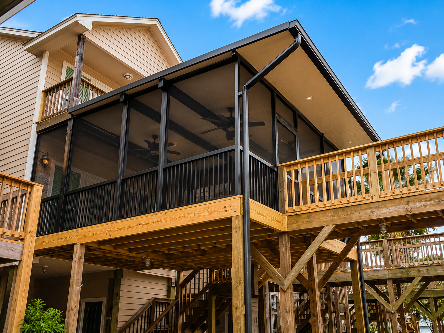 Waterfront-style patio cover and screen room addition near Clear Lake