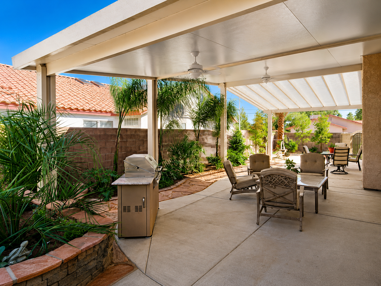 Insulated patio cover with garden view in Northwest Houston