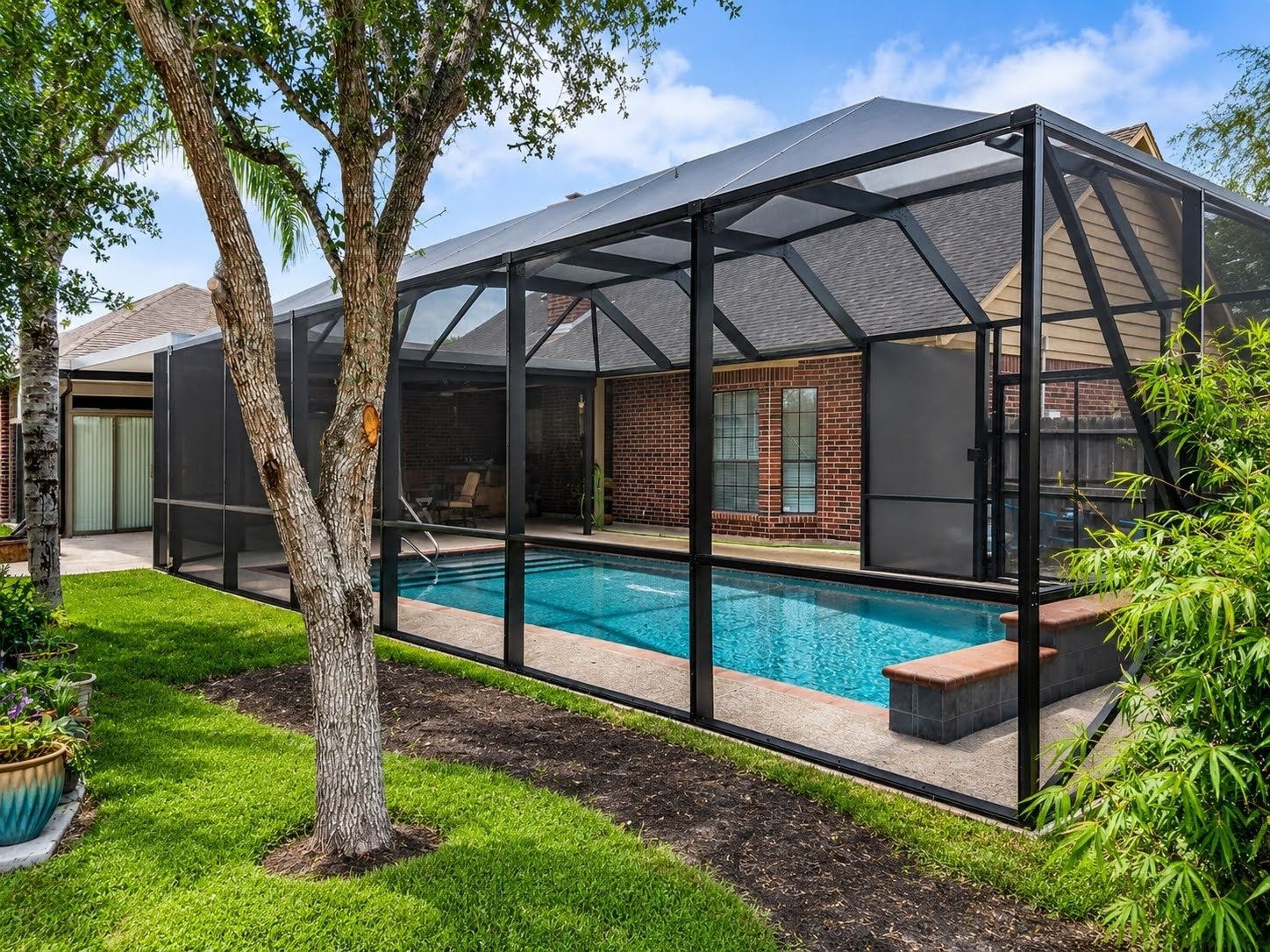 Custom pool enclosure project in Alvin, TX by Simmons Home Design