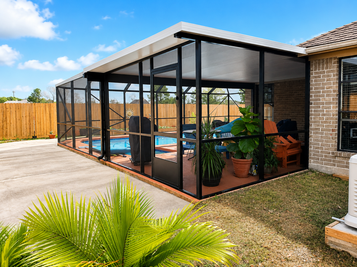 Pool cover screen enclosure built for Gulf Coast weather near Manvel TX
