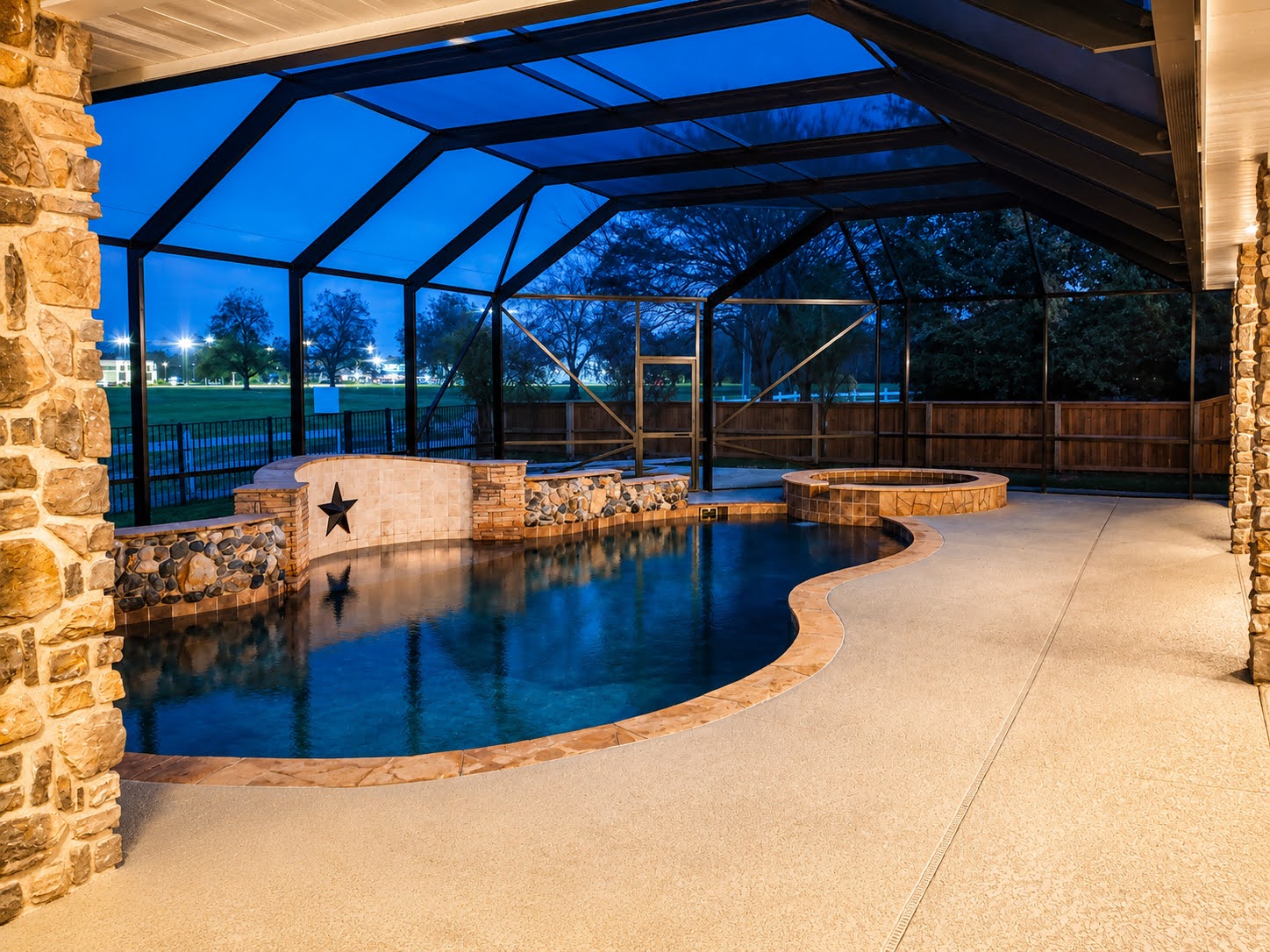 Looking out from inside a pool screen enclosure in the Clear Lake area