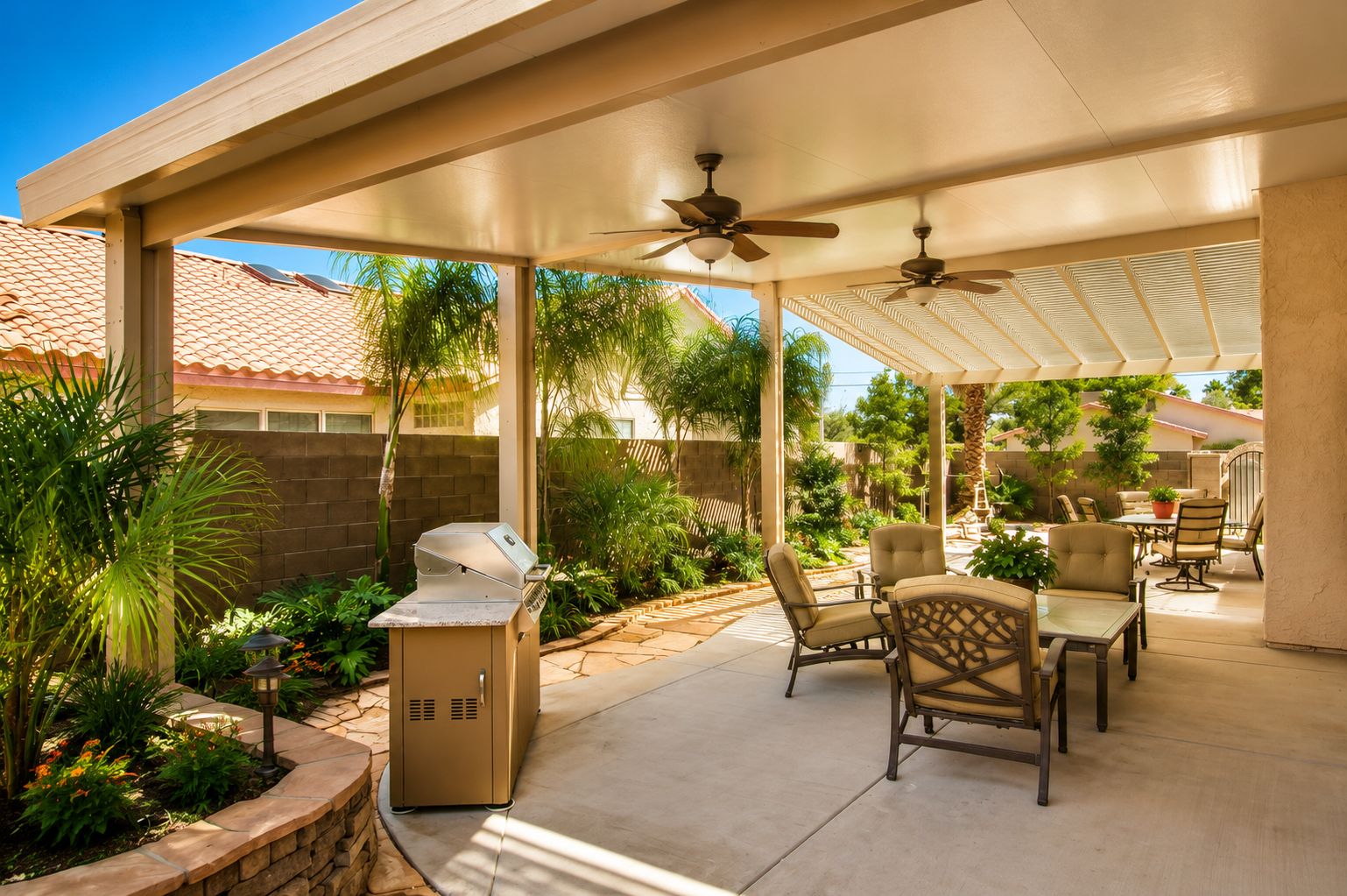 Sunny suburban Katy patio with tropical landscaping and aluminum patio cover