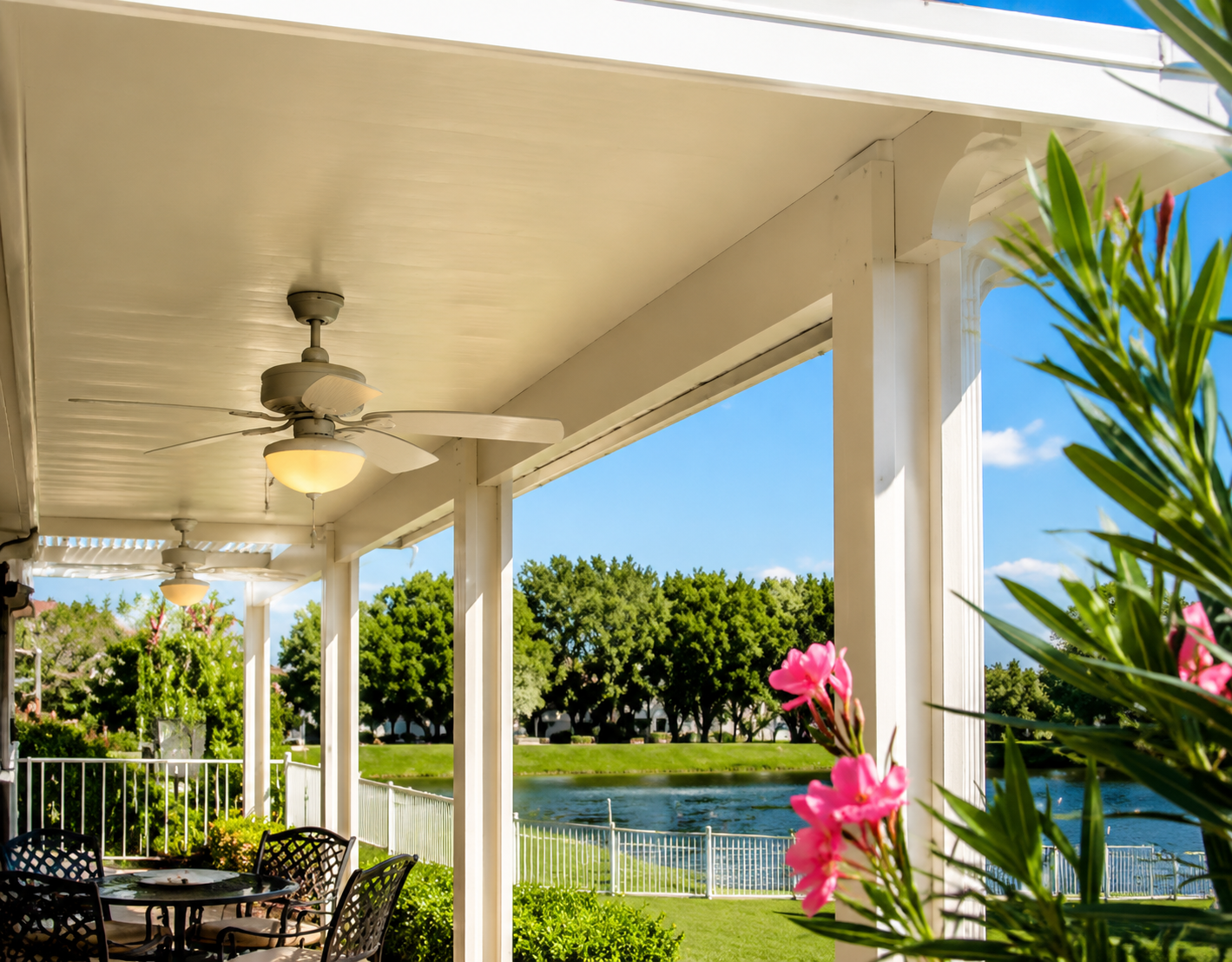 Waterfront patio with shade structure near Lake Conroe