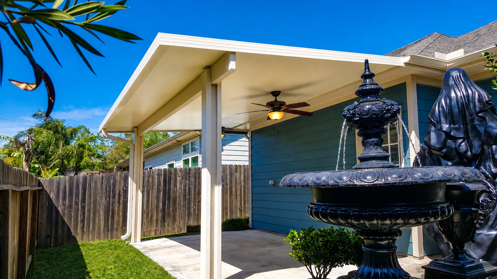 Patio cover with fan beam for Manvel outdoor seating area