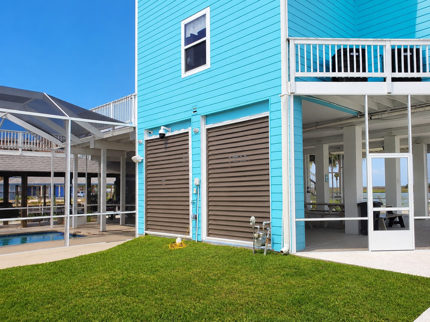 Waterfront home near Clear Lake, TX with a custom pool enclosure