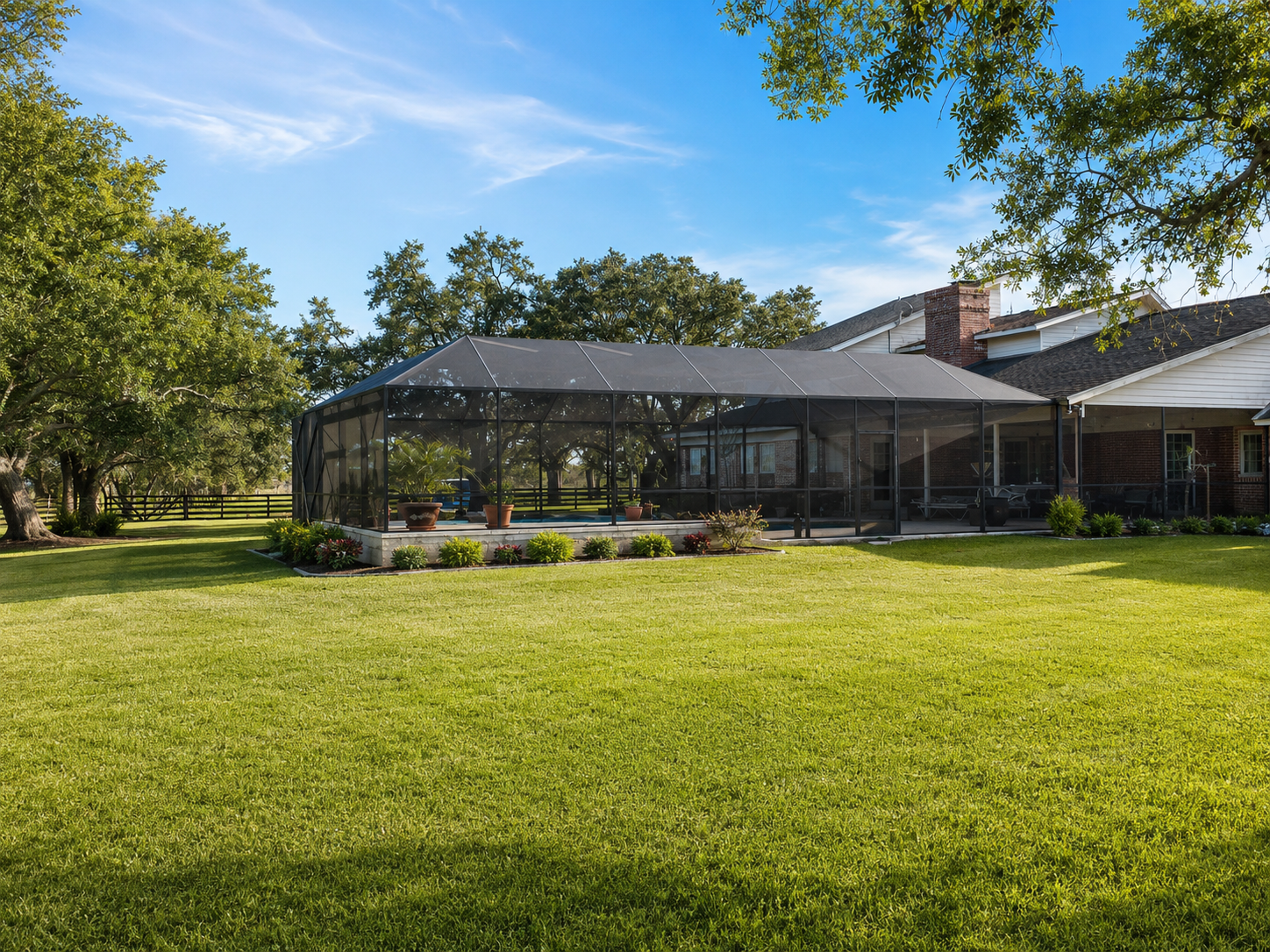 Bronze aluminum pool enclosure framing for a Gulf Coast home